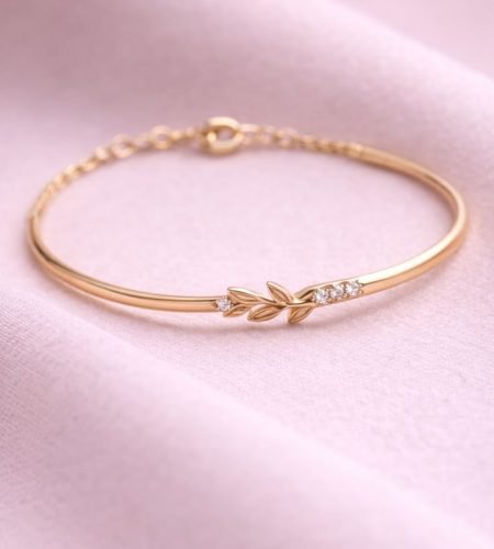 About minimal leaf gold bracelet – delicate nature spark